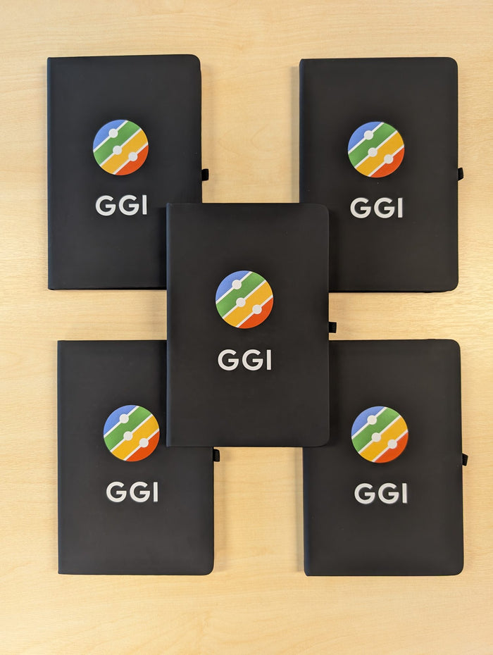 Google logo on black notebooks