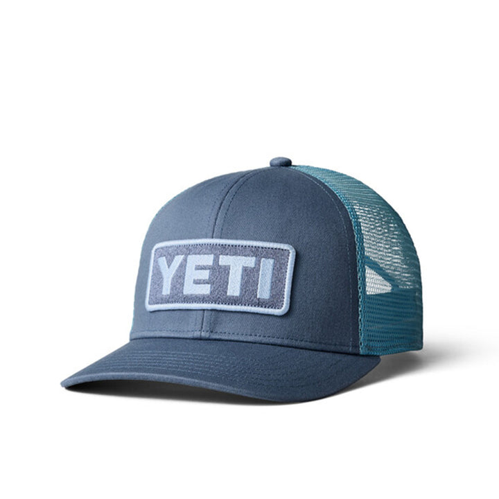 Yeti Logo Badge Trucker Hat #color_indigo