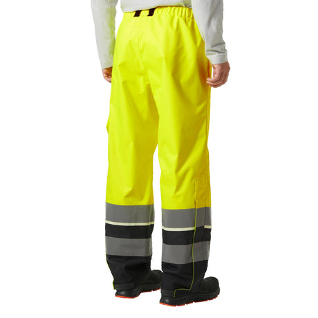 Helly Hansen Workwear Men's UC-ME Shell Pant Cl2 Hi Vis Yellow/Ebony / Small-Hi Vis Yellow/Ebony / Medium-Hi Vis Yellow/Ebony / Large-Hi Vis Yellow/Ebony / X-Large-Hi Vis Yellow/Ebony / XX-Large #- 53 Degrees North 