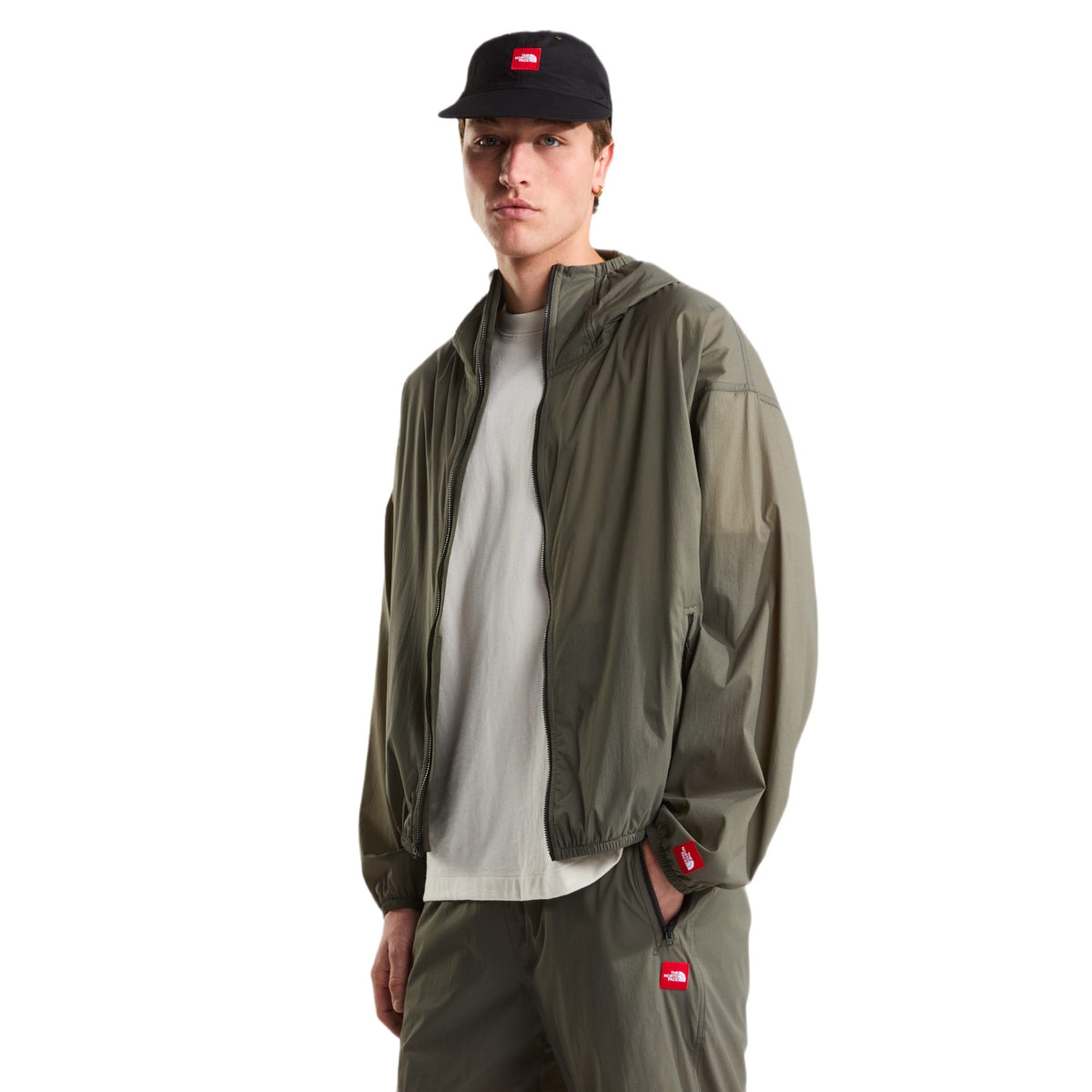 The North Face Men's TNF Red Box Packable Hooded Wind Jacket New Taupe Green / Small - 53 Degrees North