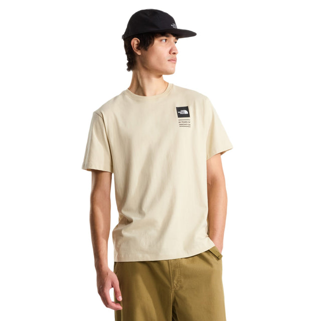 The North Face Men's Icon Celebration T-Shirt Desert Stone / Small-Desert Stone / Medium-Desert Stone / Large-Desert Stone / X-Large-Desert Stone / XX-Large #- 53 Degrees North 