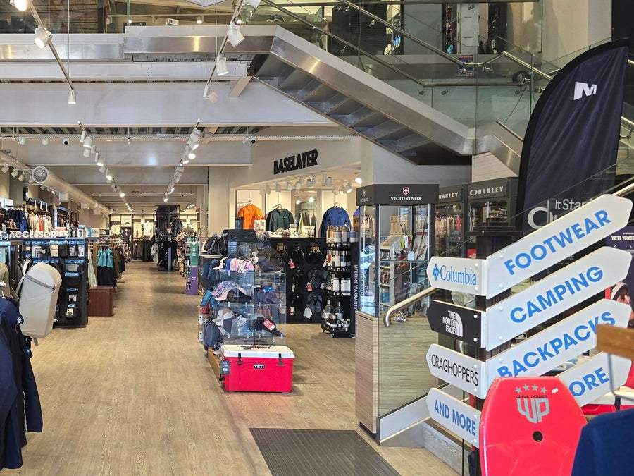 The entrance to 53 Degrees North Blanchardstown, with signs to footwear, camping and backpacks