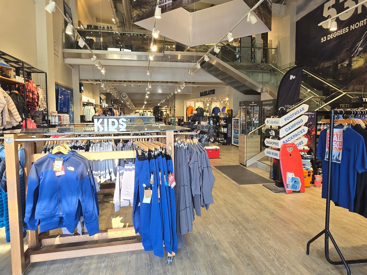 The ground floor of 53 Degrees North Blanchardstown, with kids' clothing at the front and the stairs to the upper floor