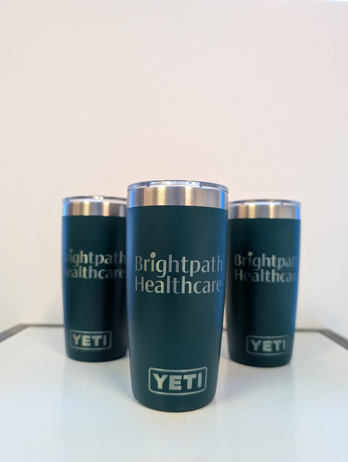 Brightpath Healthcare logo on green YETI tumblers